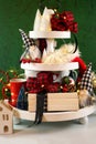 Christmas holiday on-trend Farmhouse aesthetic three tiered tray decor. Royalty Free Stock Photo