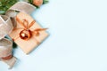 Christmas holidays on blue card with Christmas tree, decoration and paper gift box, copy space for your text Royalty Free Stock Photo