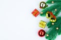 Christmas holidays composition, top view of red and gold Christmas decorations on white background with copy space for text. Flat Royalty Free Stock Photo