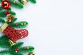 Christmas holidays composition, top view of red and gold Christmas decorations on white background with copy space for text. Flat Royalty Free Stock Photo