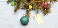 Christmas holidays concept. Decorative ball toy and gift tag copy space. Get ready for christmas. Christmas decorations Royalty Free Stock Photo