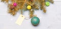 Christmas holidays concept. Decorative ball toy and gift tag copy space. Get ready for christmas. Christmas decorations Royalty Free Stock Photo