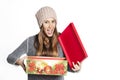 Christmas, holidays, love and happiness concept - surprised girl with gift box Royalty Free Stock Photo