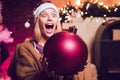 Christmas holidays sale discounts. Expressions face. Woman hold bomb. Crazy Christmas and Happy New Year. Crazy comical Royalty Free Stock Photo