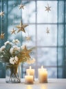 Christmas home decor with candles,flowers and Christmas ornaments Royalty Free Stock Photo