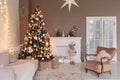 Christmas home decor with old furniture and tree Royalty Free Stock Photo