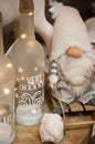 CHristmas home decorations with dwarf and bottled candles