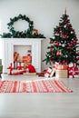 Christmas home interior Christmas tree red gifts new year decor festive background Royalty Free Stock Photo