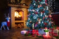 Christmas home interior with tree and fireplace Royalty Free Stock Photo