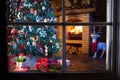 Christmas home interior with tree and fireplace Royalty Free Stock Photo