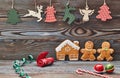 Christmas homemade decoration, gingerbread house and couple - man and woman. Royalty Free Stock Photo