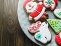 Christmas homemade gingerbread cookies, spices and cutting board on dark background, top view. holiday, celebration and cooking Royalty Free Stock Photo