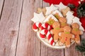 Christmas homemade gingerbread cookies on wooden table. Top view Royalty Free Stock Photo