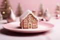 Christmas Homemade gingerbread the shape of a three-dimensional house,with pink glaze,festive treat