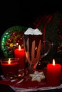 Christmas hot chocolade with marshmallow and homemade cookies decorated candles