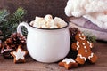 Christmas Hot Chocolate With Marshmallows, Cookies And Decor Against A Wood Background