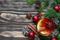 Christmas hot mulled wine with cinnamon, anise and fir tree branches with decorations Royalty Free Stock Photo