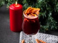 Christmas hot mulled wine with cinnamon, orange and tree on board Royalty Free Stock Photo