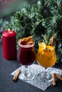 Christmas hot mulled wine with cinnamon, orange and tree on board Royalty Free Stock Photo