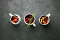 Christmas hot mulled wine or gluhwein drink in a cups with orange citrus,apple,cinnamon sticks and stars anise Royalty Free Stock Photo