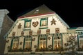 Christmas House in Germany decorated with hearts and stars made of gingerbread like the house in the tale of Hansel and Gretel 