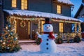 A Christmas house with a snowman in the yard