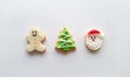 Christmas icon decoration on butter cookies on white background