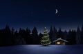 Christmas Illuminated hut in cold winternight