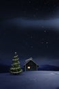 Christmas Illuminated hut in cold winternight