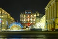 Christmas illumination figures on the street of the city. The snowstorm. Royalty Free Stock Photo