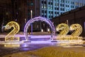 Christmas illumination figures on the street of the city. The snowstorm. Royalty Free Stock Photo