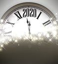 Golden shining 2020 New Year background with clock