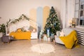 Christmas interior children& x27;s room, bedroom, nursery. Wooden shelves and toys. Royalty Free Stock Photo