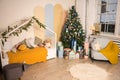 Christmas interior children& x27;s room, bedroom, nursery. Wooden shelves and toys. Royalty Free Stock Photo