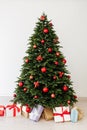 Christmas interior Christmas tree presents the new year as a backdrop Royalty Free Stock Photo
