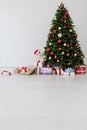 Christmas Interior Christmas Tree Presents New Year as a backdrop Royalty Free Stock Photo