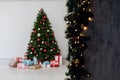 Christmas Interior Christmas Tree Presents New Year as a backdrop Royalty Free Stock Photo