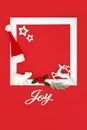 Christmas Joy Sign Background with Festive Tree Decorations Royalty Free Stock Photo