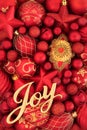 Christmas Joy Sign and Red Gold Bauble Ornaments Royalty Free Stock Photo