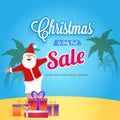 Christmas in July Fest, poster, banner or flyer design with Happy Santa chilling on beach, with gift boxes. Royalty Free Stock Photo