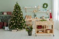 Christmas kitchen decorations with classic Christmas tree in silver and Golden colors