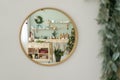 Christmas kitchen decorations reflected in golden mirror Royalty Free Stock Photo