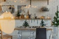 Christmas kitchen table in loft style decoration Royalty Free Stock Photo