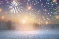 Christmas landscape at night with fireworks in dark sky. Xmas background. Winter nature Royalty Free Stock Photo