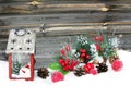 Christmas lantern decoration winter berries and snow on wooden b Royalty Free Stock Photo