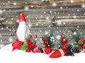 Christmas lantern decoration winter berries and snow on wooden b Royalty Free Stock Photo