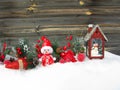 Christmas lantern decoration winter berries and snow on wooden b Royalty Free Stock Photo