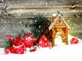 Christmas lantern decoration winter berries and snow on wooden b Royalty Free Stock Photo