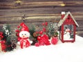 Christmas lantern decoration winter berries and snow on wooden b Royalty Free Stock Photo