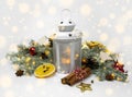 Christmas lantern lamp on white isolated background with fir branch, holiday decor, garland and snow. Cozy wonderland atmosphere Royalty Free Stock Photo